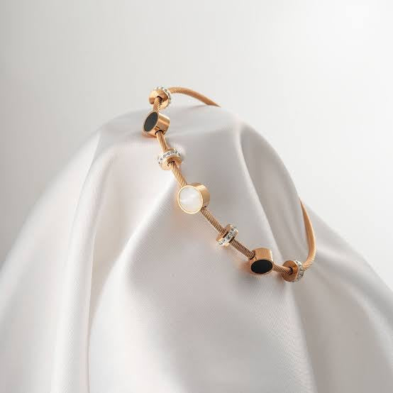 Radiant Orbit Gold Finish Bracelet for Women | JEWELHIRA