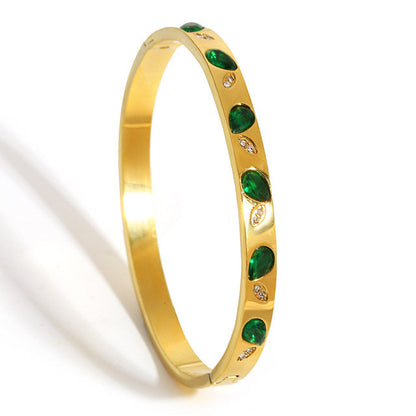 Green Charm Gold Finish Bracelet for Women | JEWELHIRA