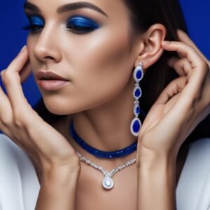 A women with royal look wearing silver jewellery with royal blue stones